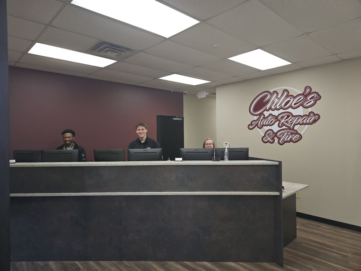 Professional automotive diagnostic equipment and toolboxes in the service area of Chloe's Auto Repair Dallas