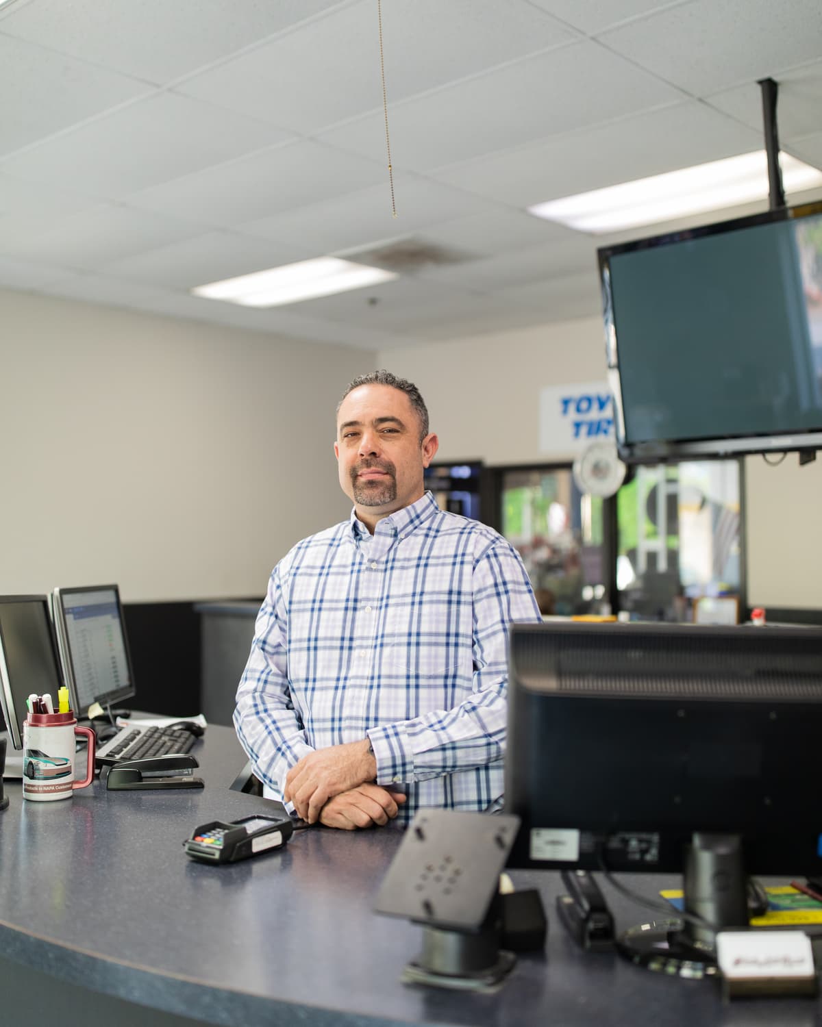 Modern, comfortable customer reception desk at Chloe's Auto Repair in Roswell GA